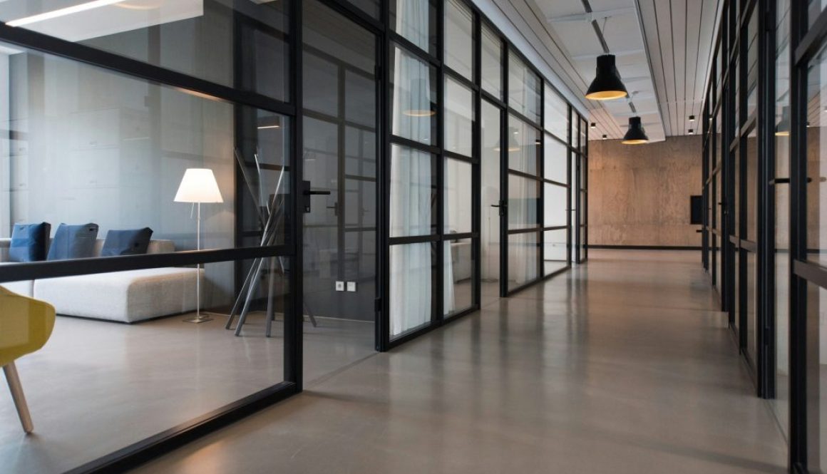 black framed glass office partitions corridor modern office design